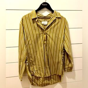 Anthropologie tan and blue stripe top with fun button design. Small.